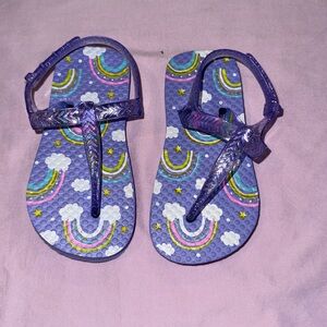Never worn Purple Rainbow and sparkle Flip Flops